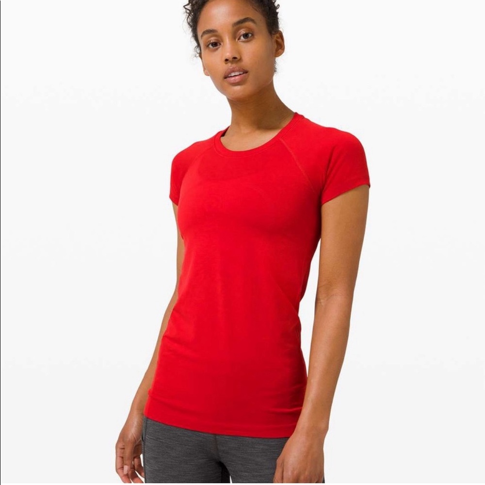 Lululemon Swiftly Tech Short-Sleeve Shirt 2.0
Hip Length, Size 14, Red.